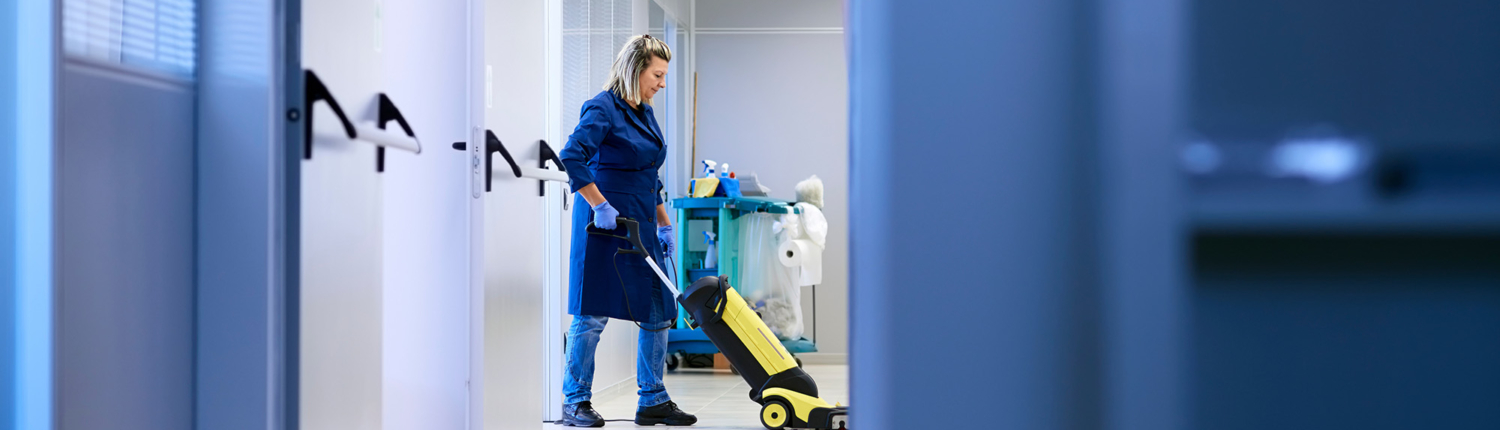 Women at workplace, professional female cleaner washing floor