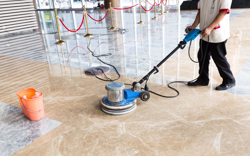 Worker Using Floor Buffing Machine
